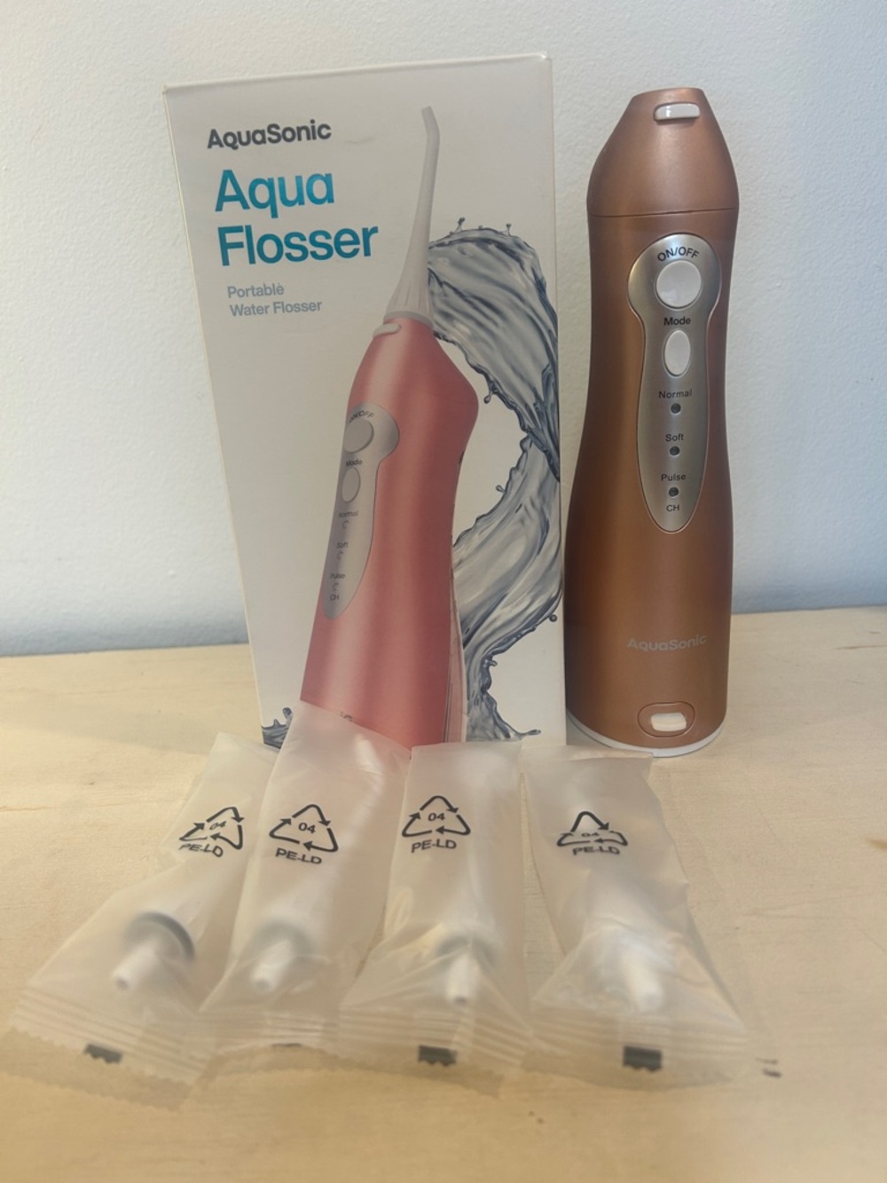 AquaSonic Aqua Flosser, Rose Gold Portable Water Flosser NEW Sealed Tips